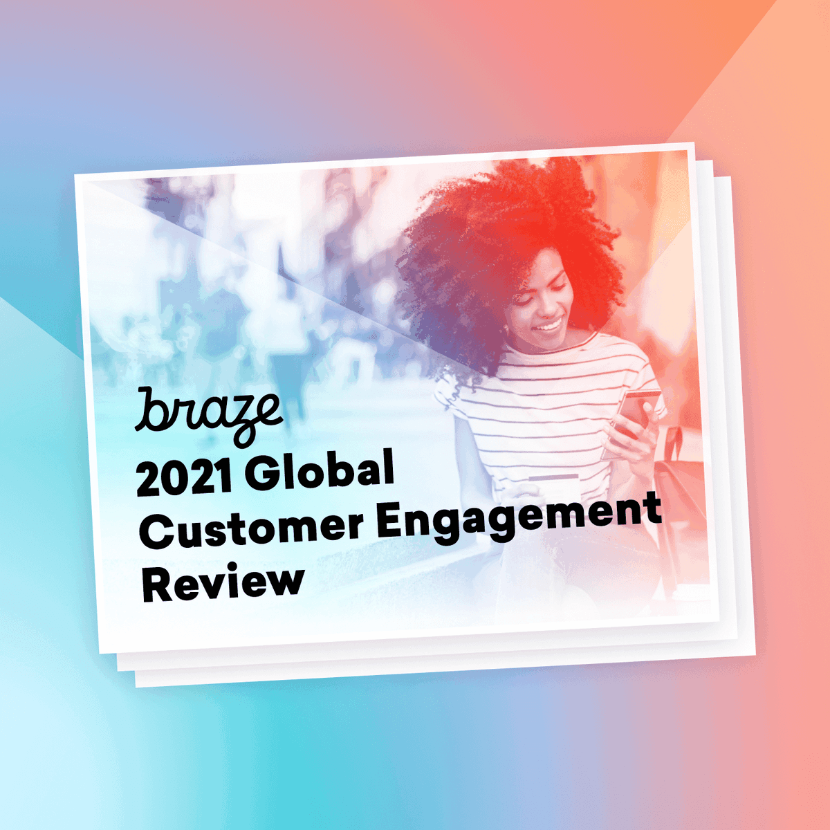 a braze 2021 global customer engagement review with a woman looking at her phone