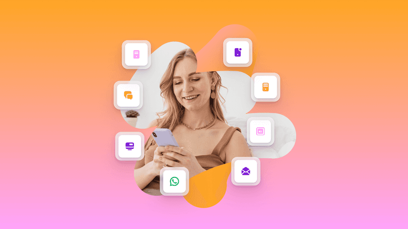 a woman is smiling while looking at her cell phone