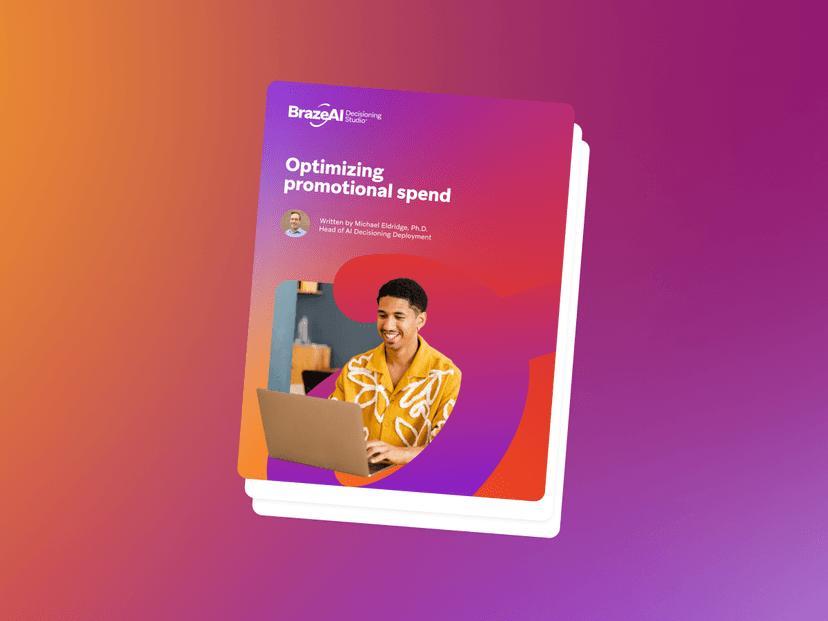 a book titled optimizing promotional spend shows a man using a laptop