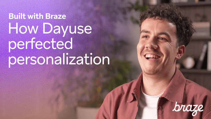 Smiling man in a casual shirt sits in an office setting beside text that reads, “Built with Braze – How Dayuse perfected personalization,” with the Braze logo in the corner.