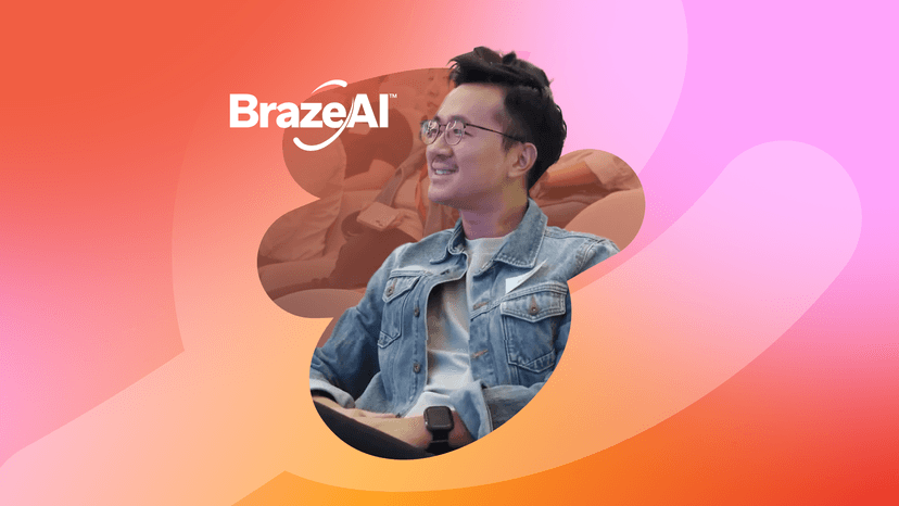 a man sitting in front of a brazeal logo