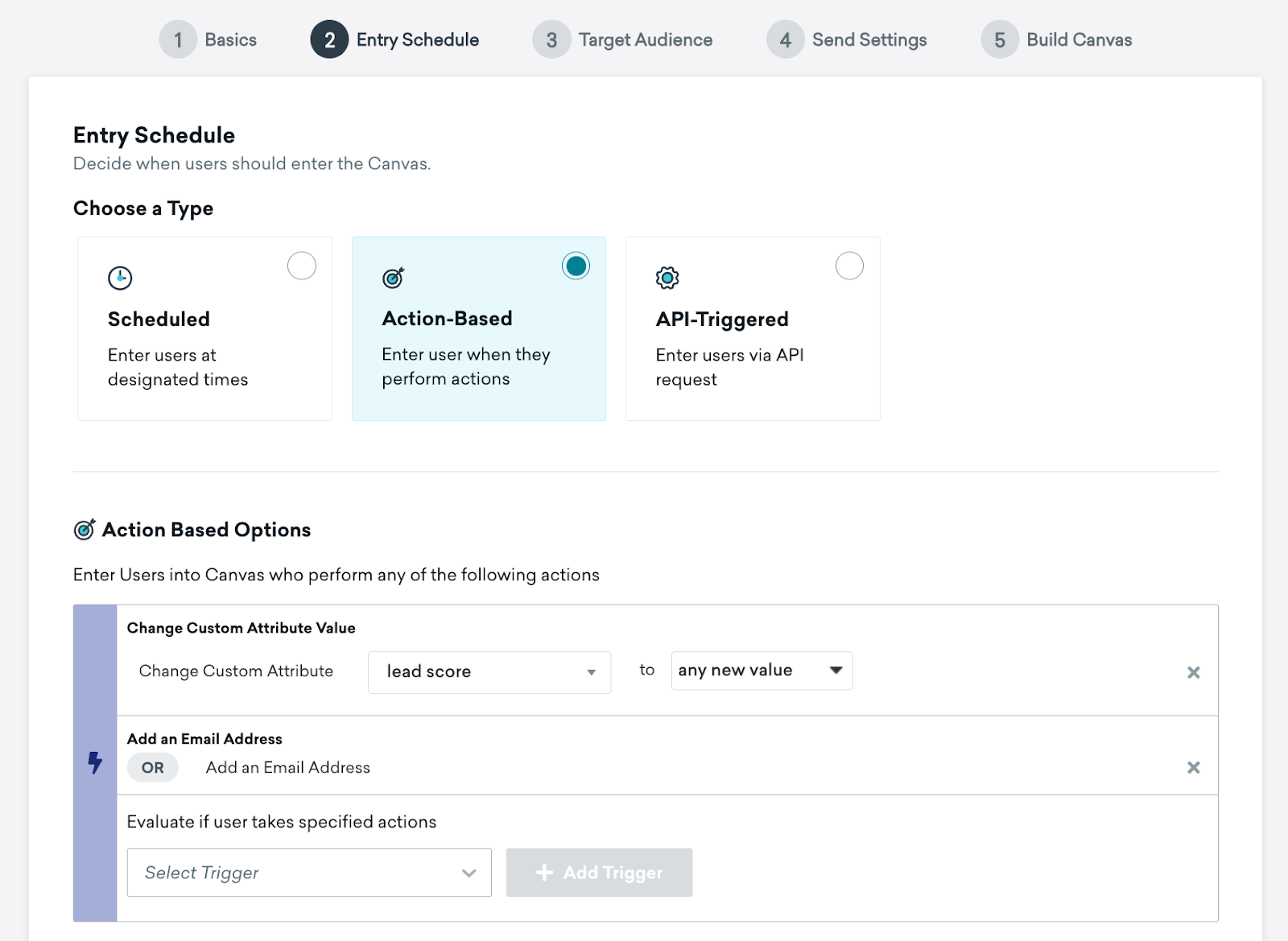 Step 2 of creating a Canvas with the entry schedule of “Action-Based” and action-based options of changing a custom attribute “lead score” and adding an email address.