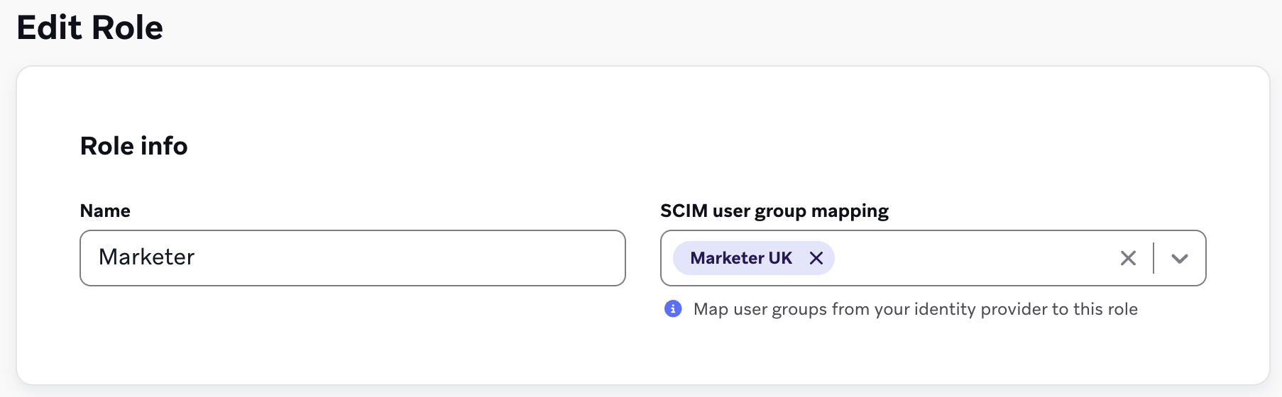 「SCIM ユーザーグループマッピング」フィールドで「Marketer UK」SCIM グループが選択されている「ロールを編集」ページ。