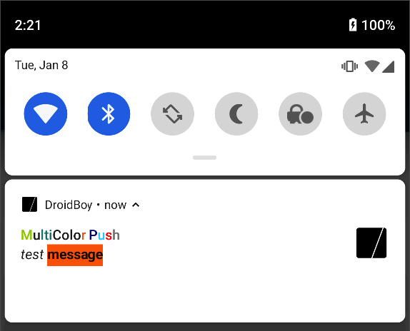 文字に複数の異なる色、斜体、背景色が指定された、Android プッシュ通知メッセージ「マルチカラープッシュテストメッセージ」。