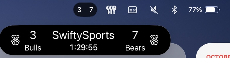 Uma captura de tela de uma barra de menu do MacOS exibindo uma Live Activity como um alerta.